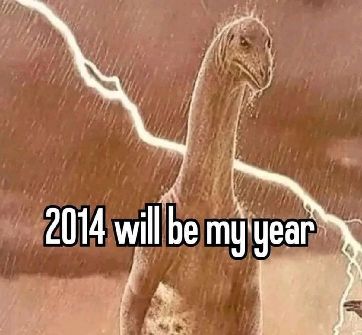 2014 will be my year Мем с динозавром и надписью «2014 will be my year» на фоне грозы