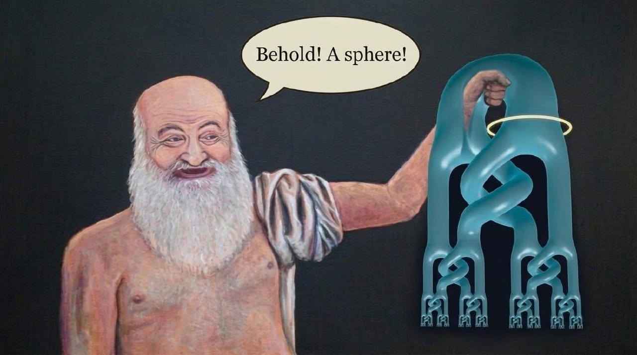 Бородатый философ показывает странную переплетённую фигуру и говорит: «Behold! A sphere!» — «Взгляните! Сфера!»