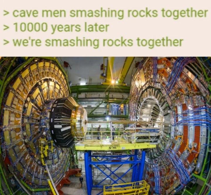 Cave men smashing rocks together Мем с надписью «Cave men smashing rocks together» и изображением Большого адронного коллайдера