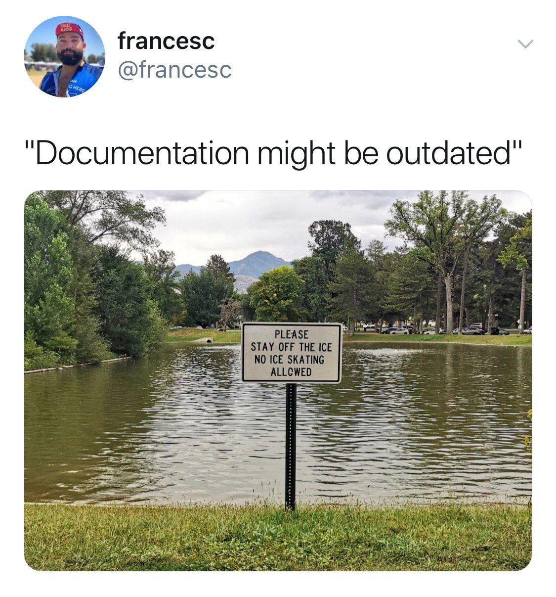 Документация может быть устаревшей Мем с надписью "Documentation might be outdated" и табличкой у водоема "Stay off the ice"