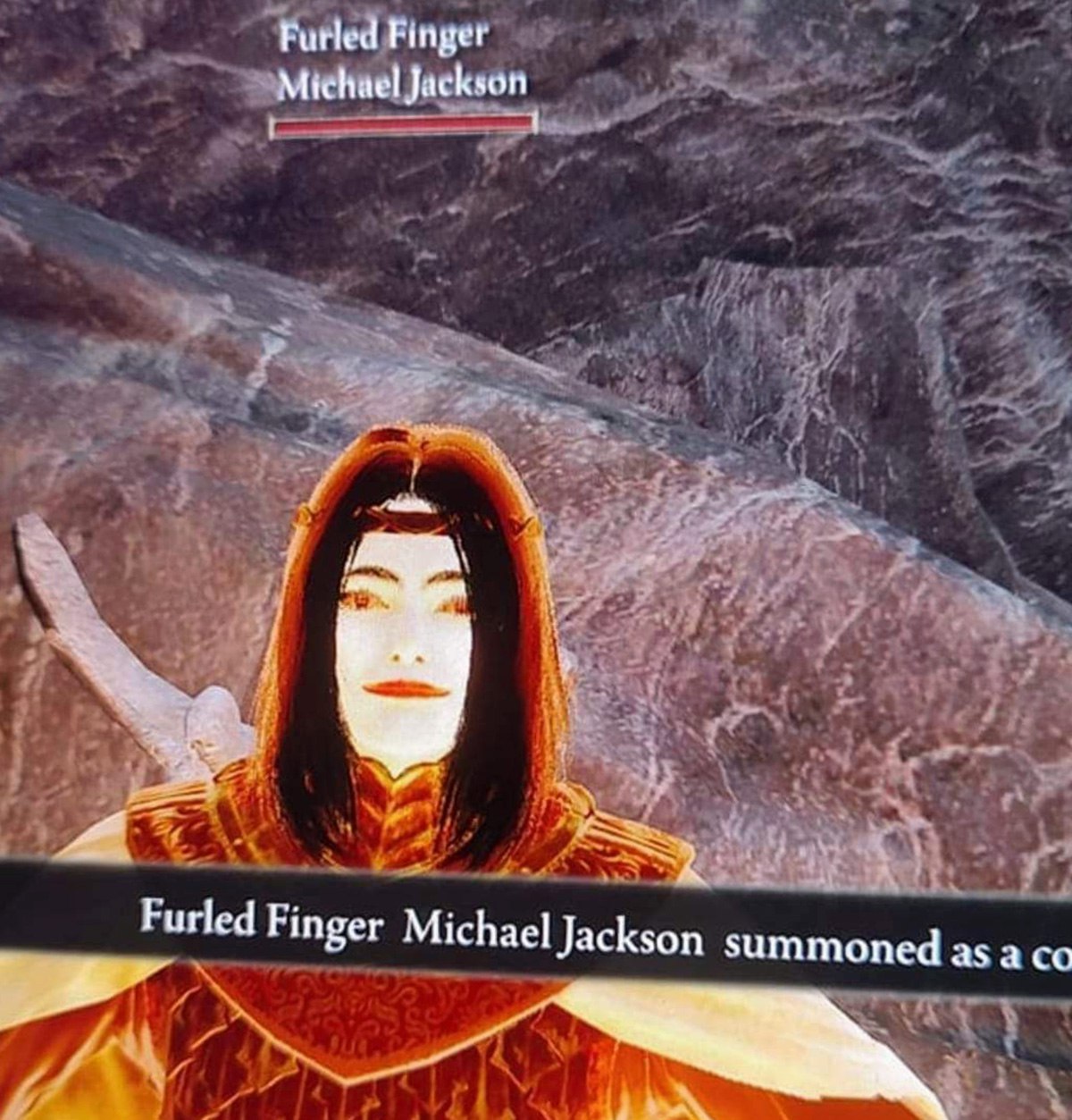 Furled Finger Michael Jackson в Elden Ring Мем с Майклом Джексоном в игре Elden Ring, призванным как союзник с именем «Furled Finger Michael Jackson»