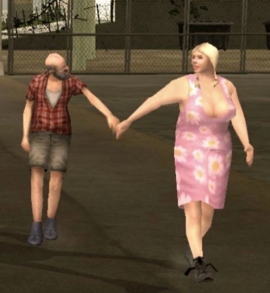 Счастливая пара из GTA San Andreas Скриншот из игры Grand Theft Auto: San Andreas, на котором изображена необычная пара, держащаяся за руки и гуляющая по улице.