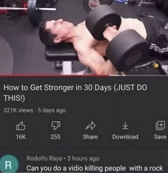Скриншот фитнес-видео «How to Get Stronger in 30 Days», под которым пользователь оставил абсурдный комментарий про убийство людей камнем.