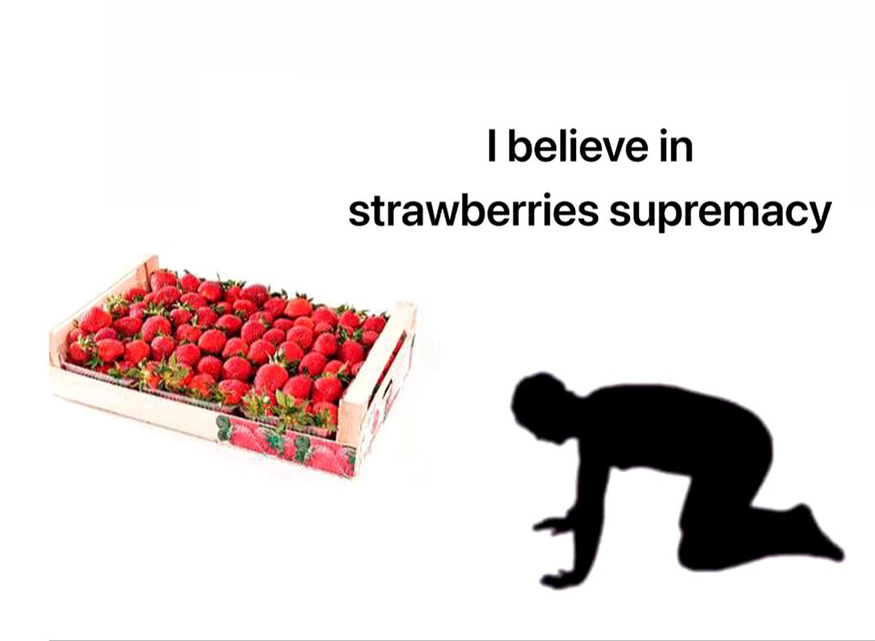 I believe in strawberries supremacy Человек кланяется клубнике, над ним написано "I believe in strawberries supremacy".