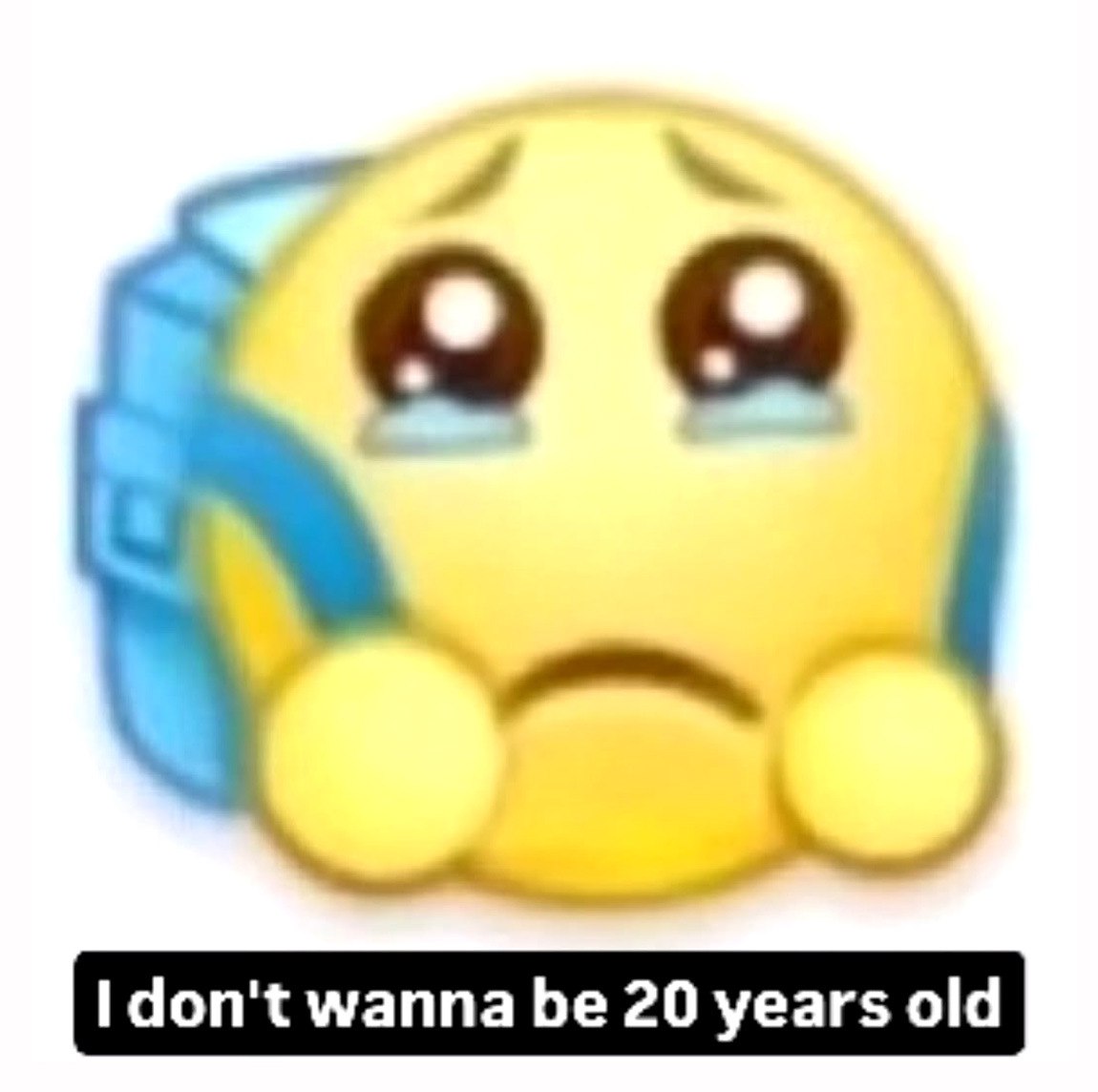 I don't wanna be 20 years old Плачущий смайлик в голубом рюкзаке со словами «I don't wanna be 20 years old»