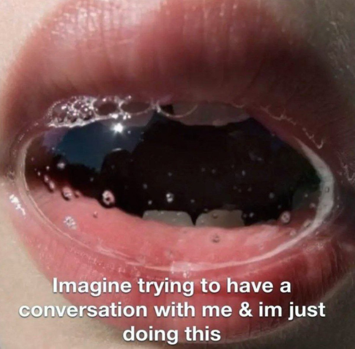 Imagine trying to have a conversation with me & im just doing this Человек делает пузырь изо рта