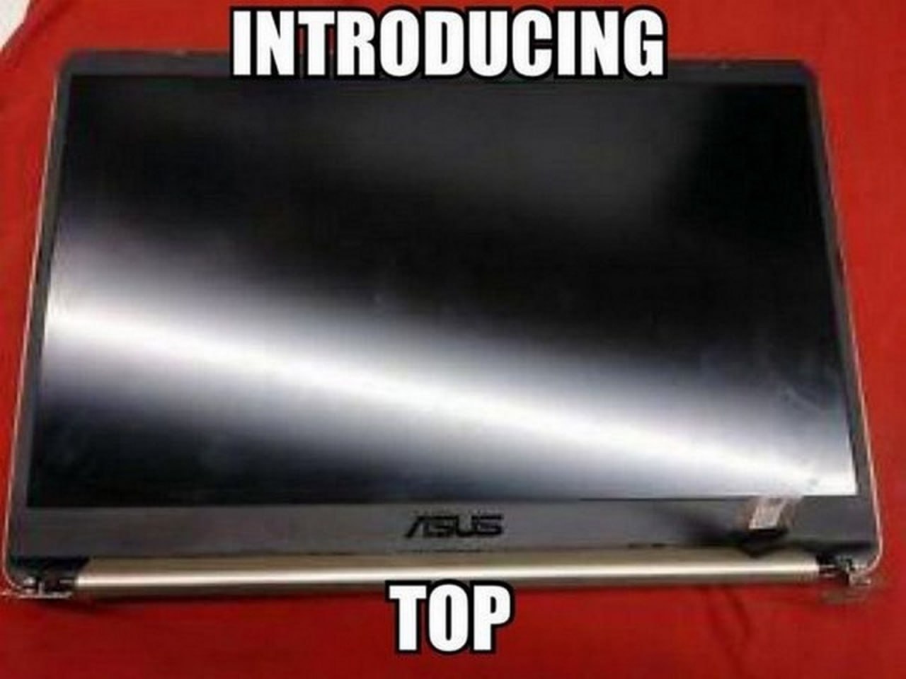 Introducing Top Мем с ноутбуком, у которого отсоединен экран, образуя фразу «Introducing Top»