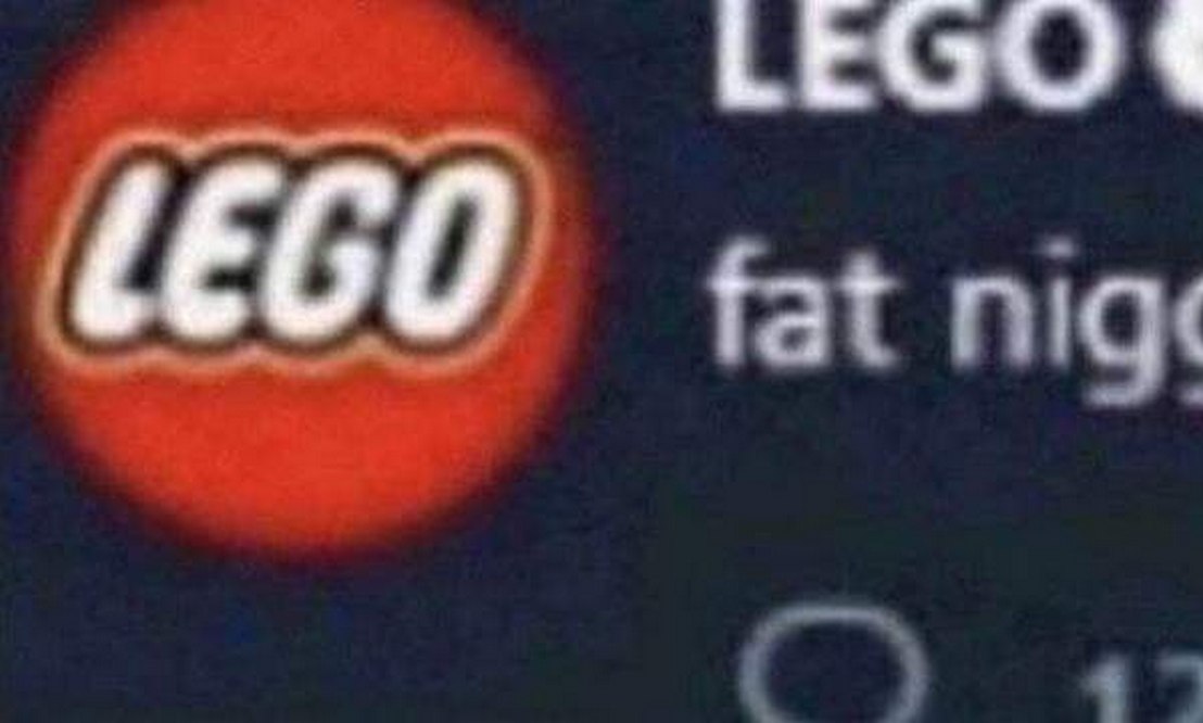LEGO fat nigg LEGO и fat nigg на темном фоне, это скриншот твита или поста, предположительно из Твиттера, с логотипом LEGO и частью надписи "fat nigg" на фоне.