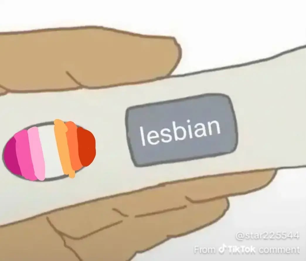 Мультяшная рука нажимает на кнопку «lesbian» рядом с яркой радужной деталью.