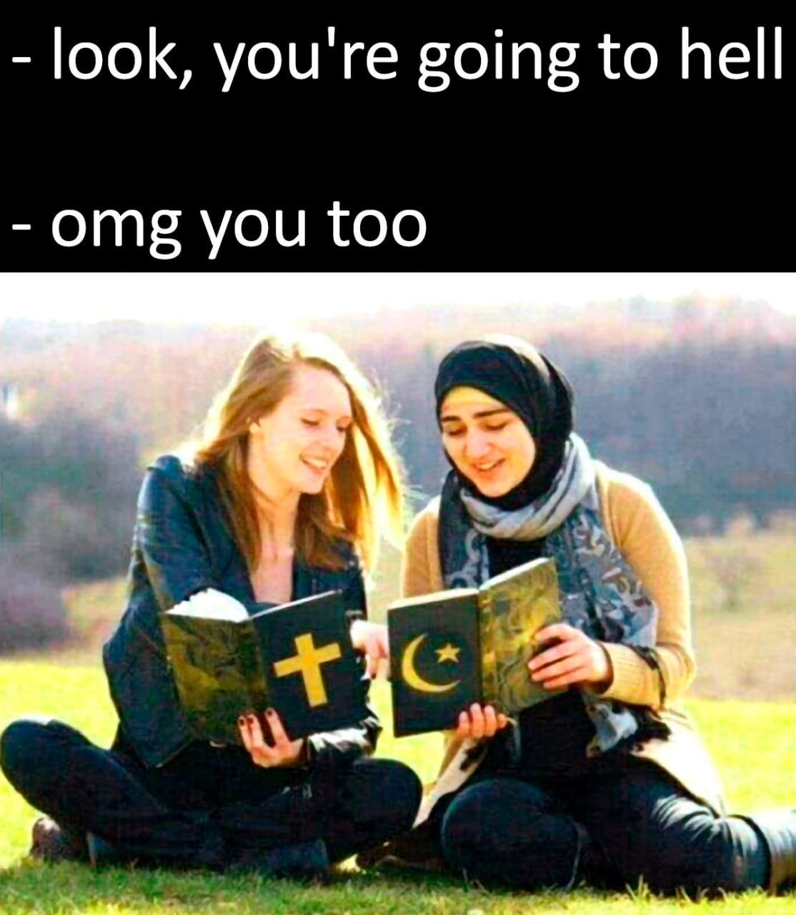 Look, you're going to hell Две девушки, исповедующие христианство и ислам, сидят на траве и обмениваются книгами, предполагая, что обе религии обещают ад другим