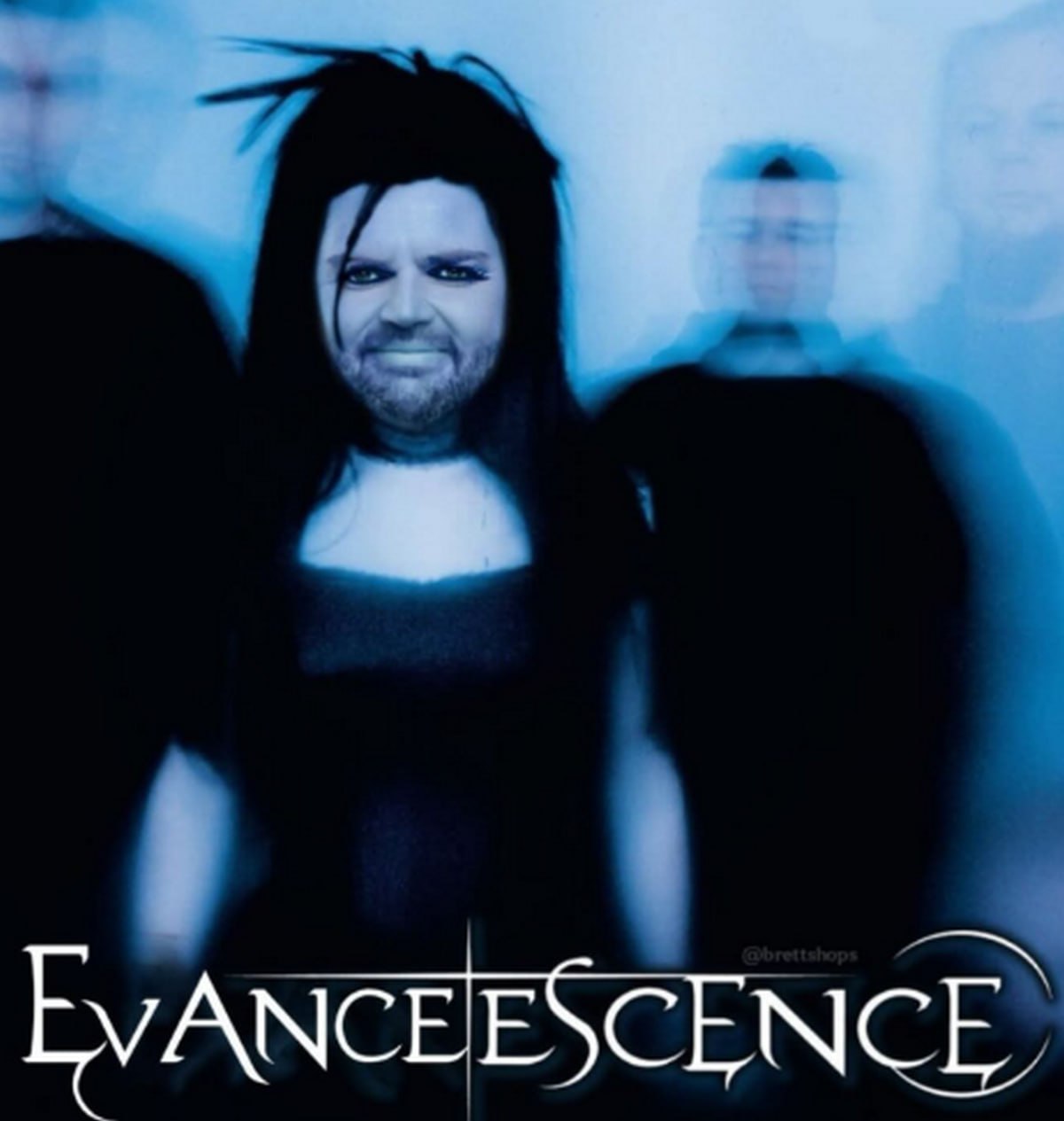 Мужчина в образе солистки Evanescence Мужчина с бородой, в парике и макияже, в роли солистки группы Evanescence на обложке альбома.