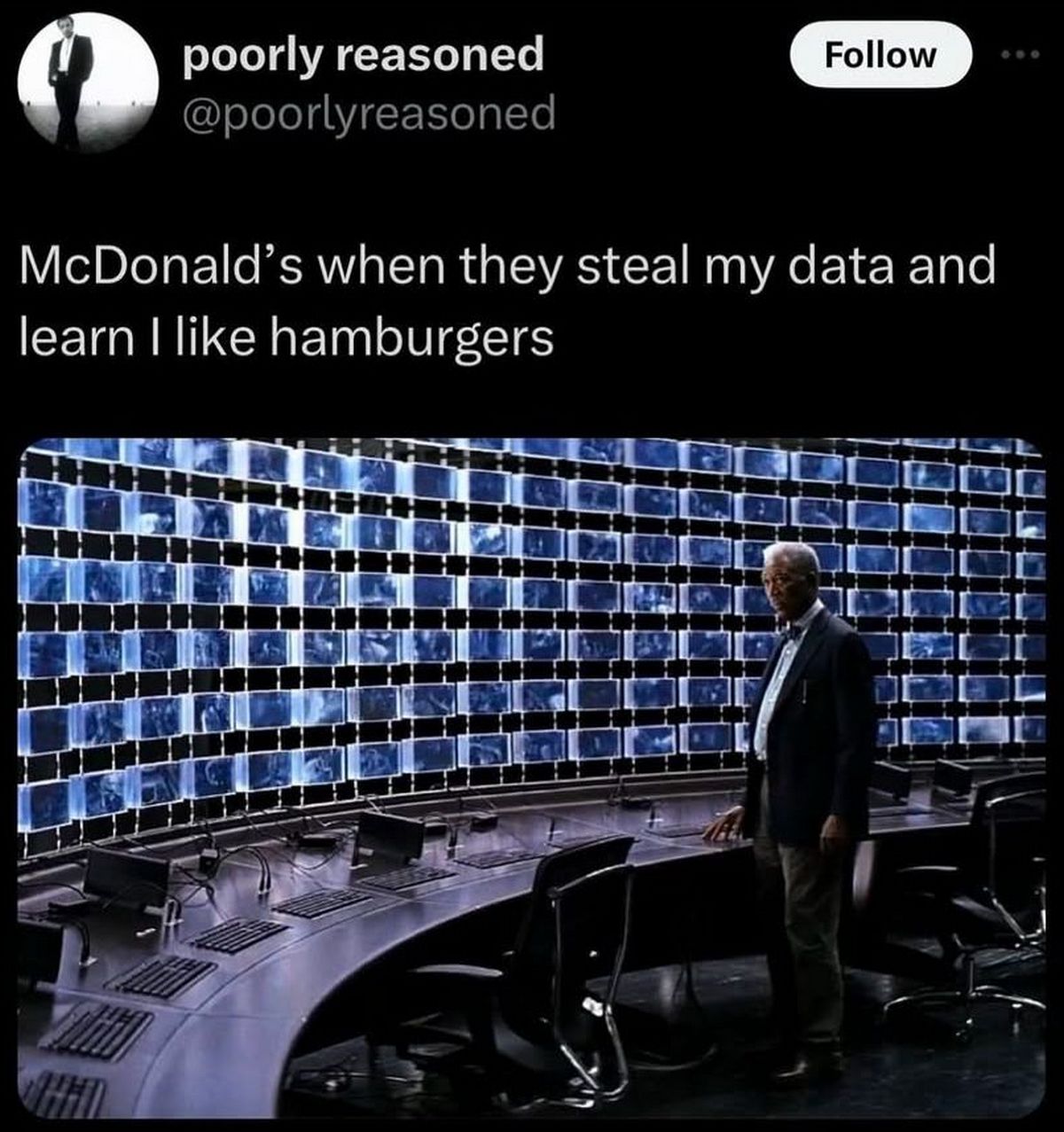 McDonald's when they steal my data and learn I like hamburgers Мем с Морган Фриман в роли Люциуса Фокса в помещении, увешанном мониторами, и надписью «McDonald's when they steal my data and learn I like hamburgers»