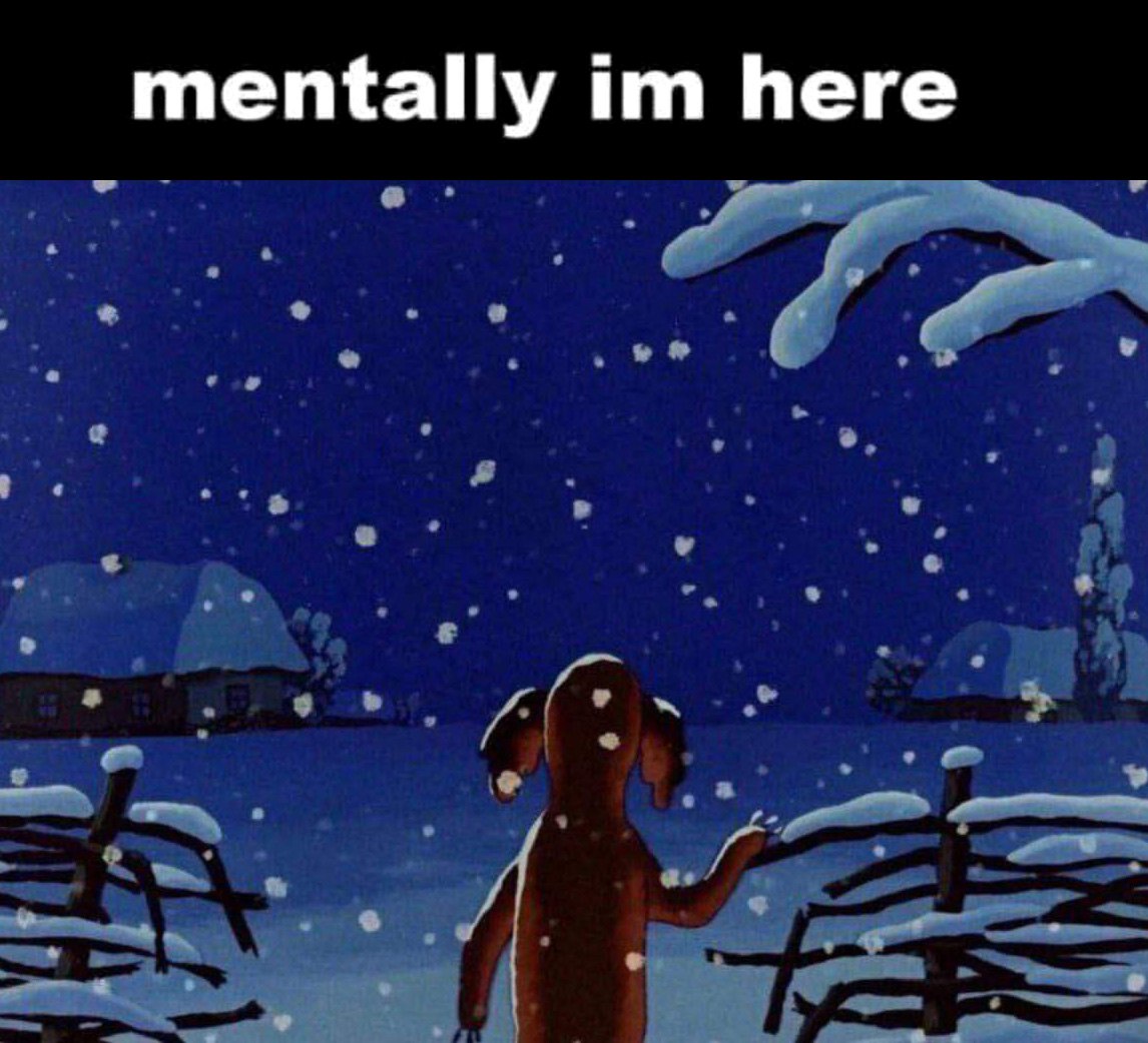 Mentally im here Щенок в заснеженной деревне под падающим снегом в темно-синюю ночь с подписью «мысленно я здесь»
