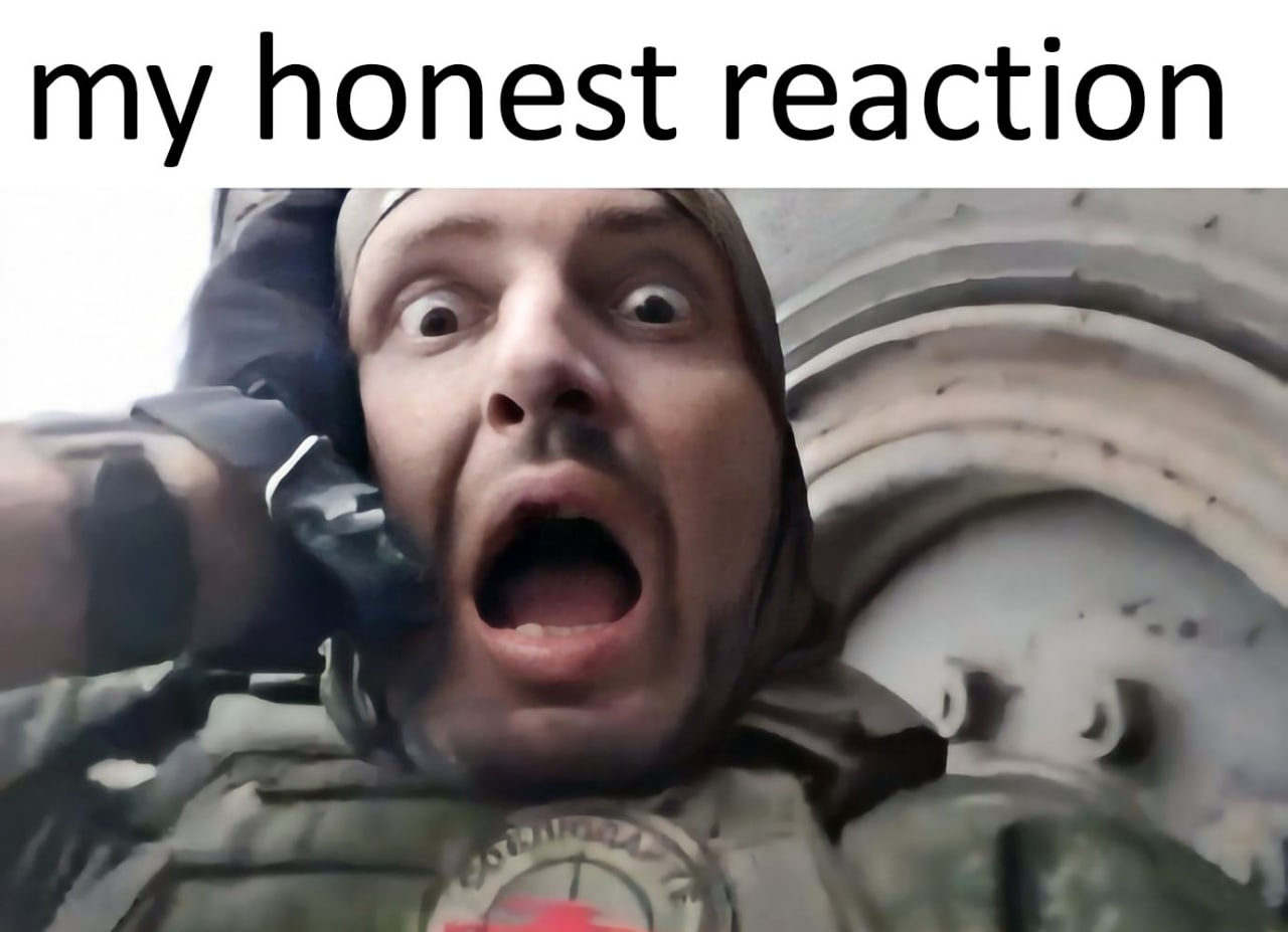 My honest reaction Мужчина в военной форме с широко раскрытыми глазами и ртом, выражающий шок или удивление, с надписью "My honest reaction" сверху.