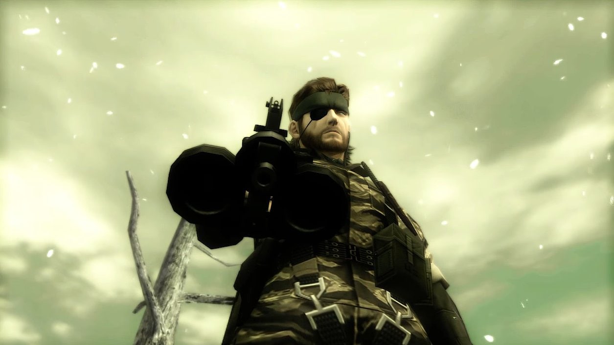 Нейкед Снейк целится из пулемета Нейкед Снейк из игры Metal Gear Solid 3: Snake Eater целится из крупнокалиберного пулемета