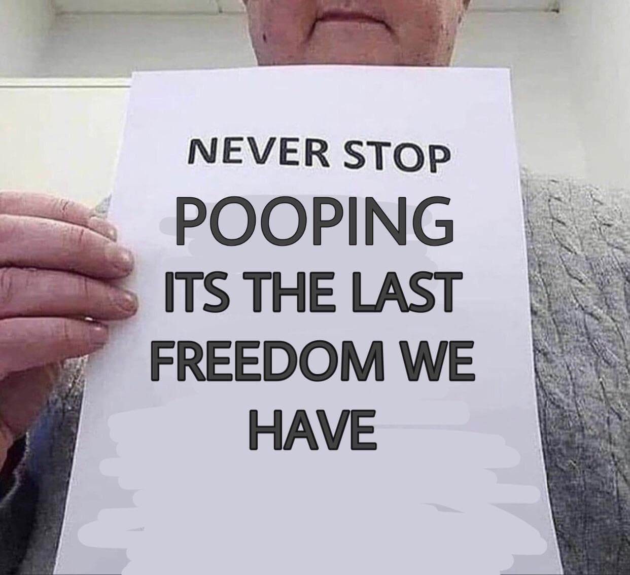 Never stop pooping, its the last freedom we have Человек держит лист бумаги с надписью «Never stop pooping, its the last freedom we have»