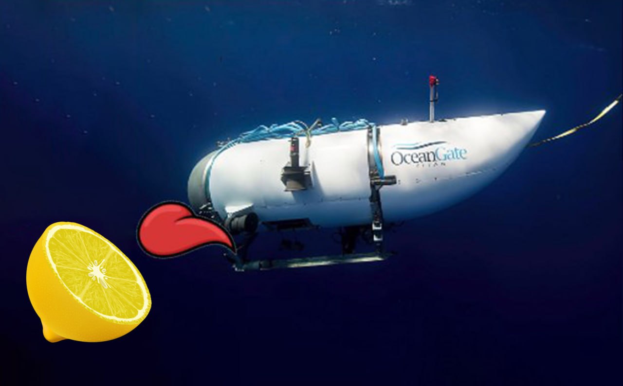 ОкеанГейт Титан лимон кровь Подводная лодка Титан OceanGate с красной каплей крови и половинкой лимона на темном фоне воды.