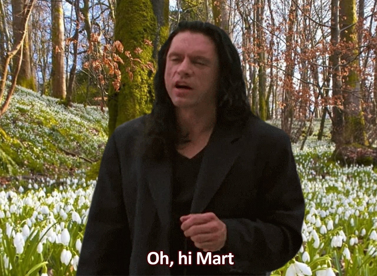 Oh, hi Mart Томми Вайсо на фоне поляны с подснежниками с подписью "Oh, hi Mart"