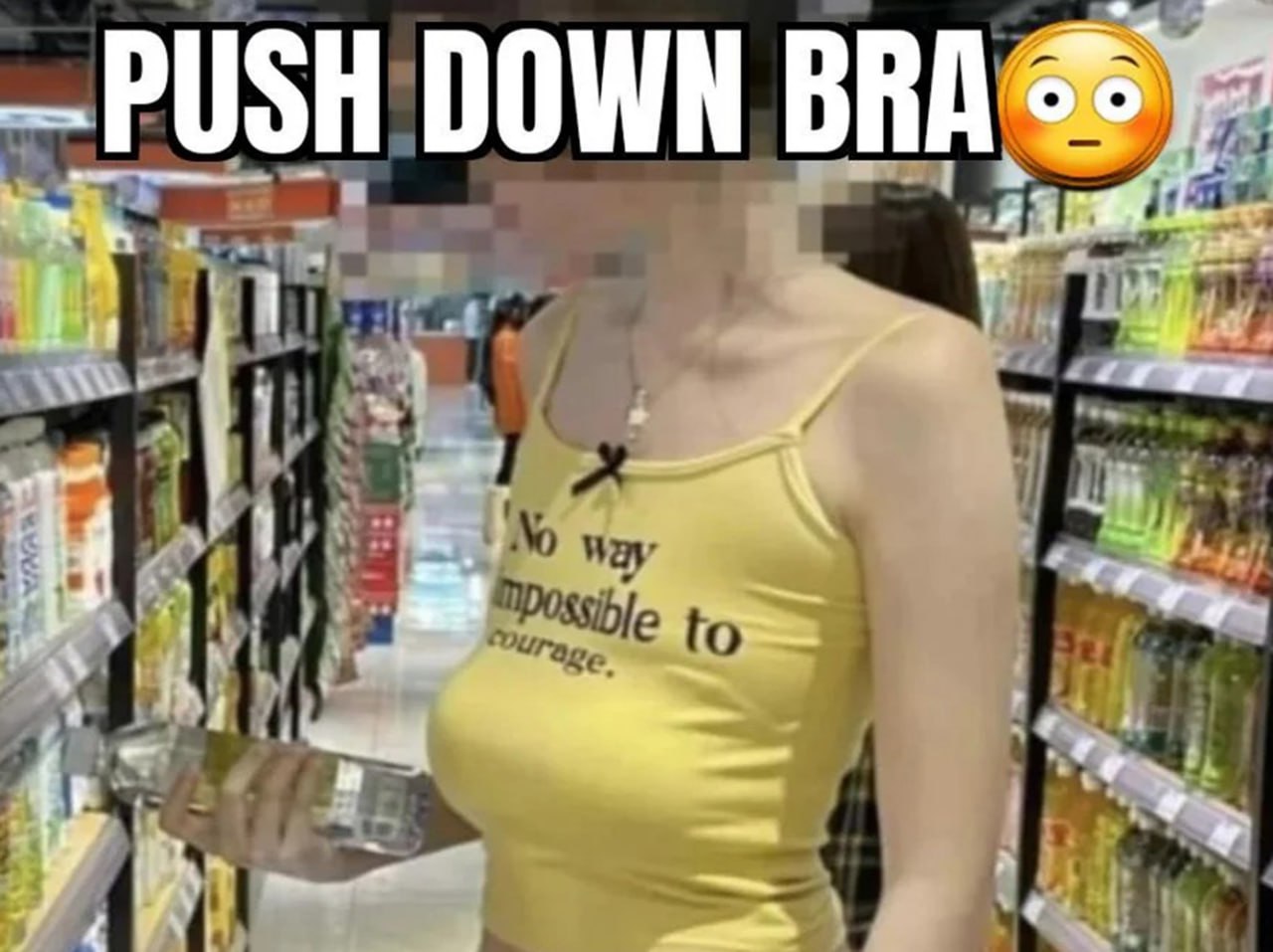 PUSH DOWN BRA Женщина в желтой майке с надписью "No way impossible to courage" и фразой "PUSH DOWN BRA" сверху.