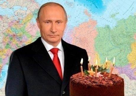 Путин с тортом Фотография Путина с тортом на фоне карты