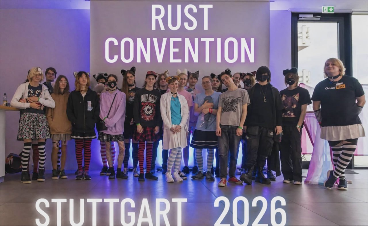 Групповое фото участников Rust Convention в Штутгарте с надписью Stuttgart 2026.