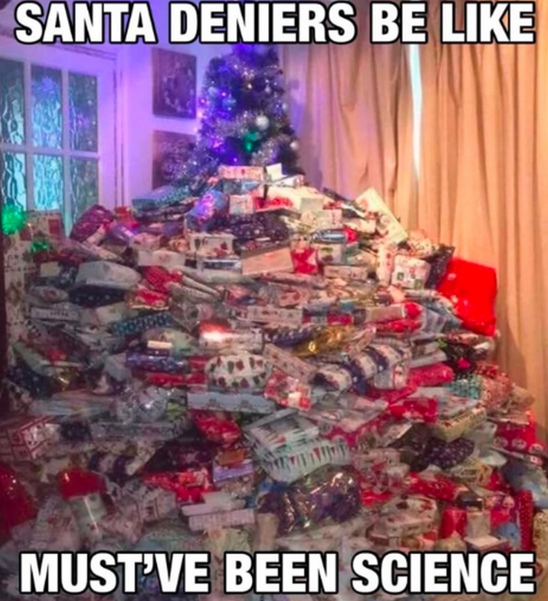 Santa deniers be like Must've been science Мем про комнату, заваленную подарками, и надпись Santa deniers be like Must've been science