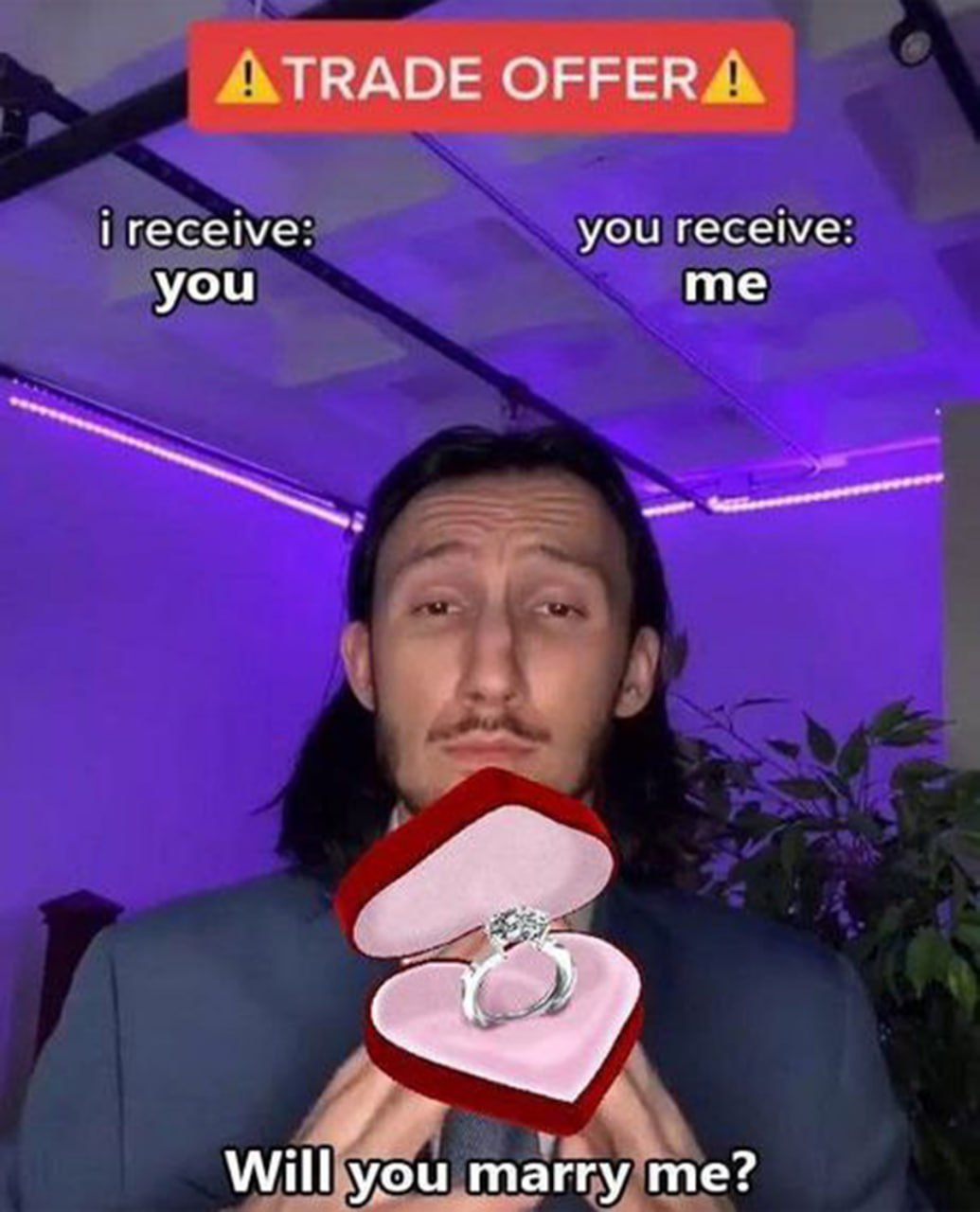 TRADE OFFER will you marry me Мужчина делает предложение руки и сердца, держа в руках коробочку с кольцом, а над ним текст «TRADE OFFER! i receive: you; you receive: me; Will you marry me?»