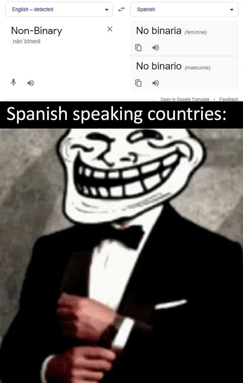 Мем "Trollface в костюме с гугл-переводчиком" про небинарных людей Мем с изображением Троллфейса, одетого в элегантный костюм, и скриншотом гугл-переводчика, переводящего слово "небинарный" на испанский язык с указанием женского и мужского рода. Мем подписан: "Испаноговорящие страны:"