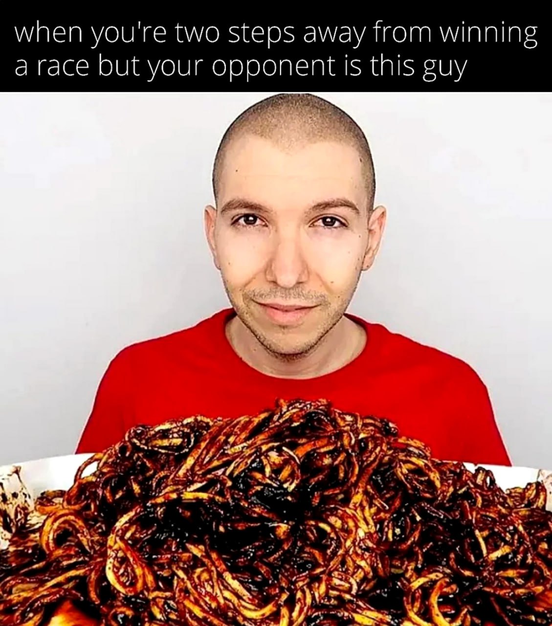 When you're two steps away from winning a race but your opponent is this guy Никас Авокадо с огромной тарелкой тёмной лапши и надписью «When you're two steps away from winning a race but your opponent is this guy»
