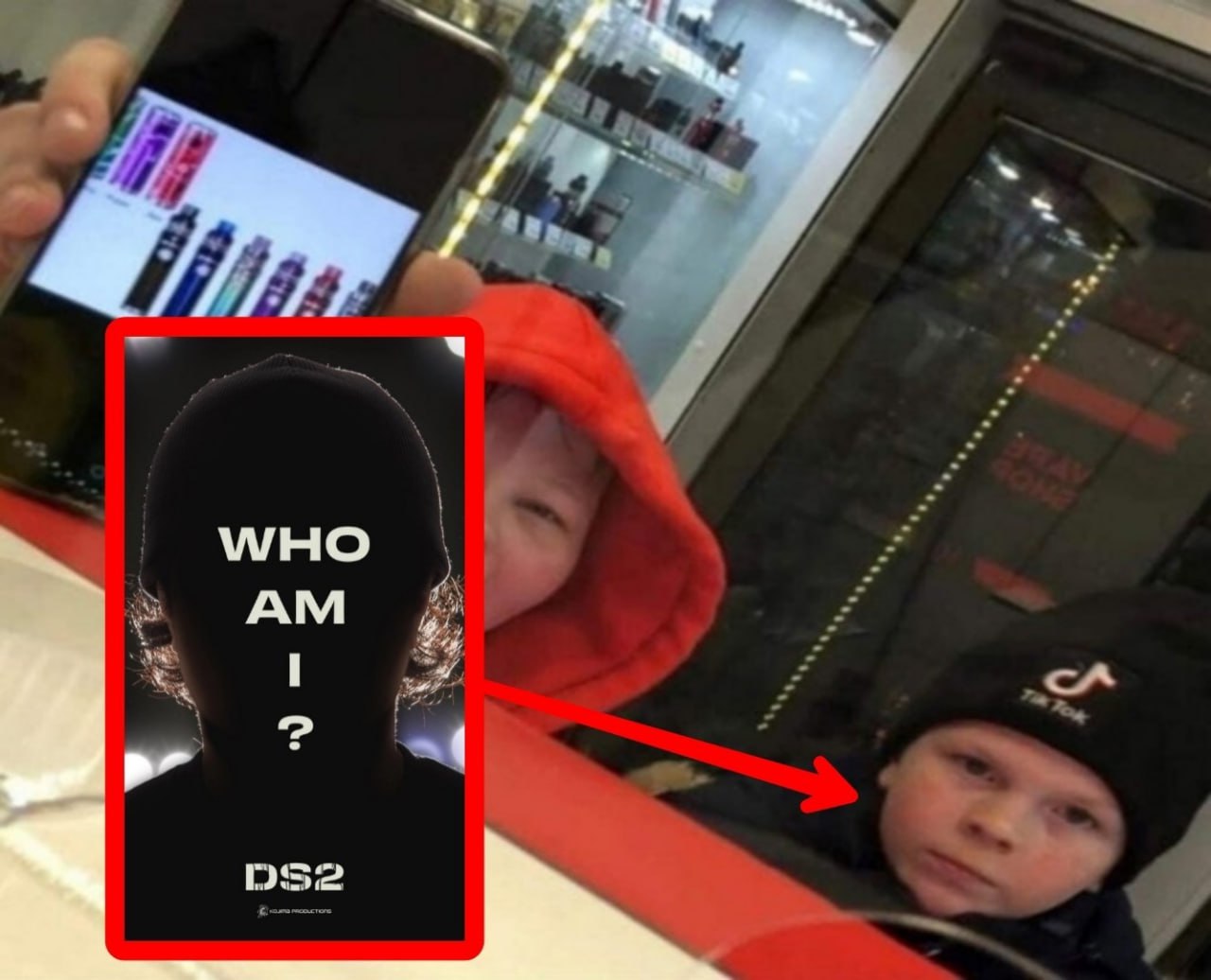 Who am I и мальчик, похожий на силуэт Мем с фразой «Who am I?» и мальчиком, похожим на силуэт с картинки, показывающий на него телефон с электронными сигаретами на фоне.