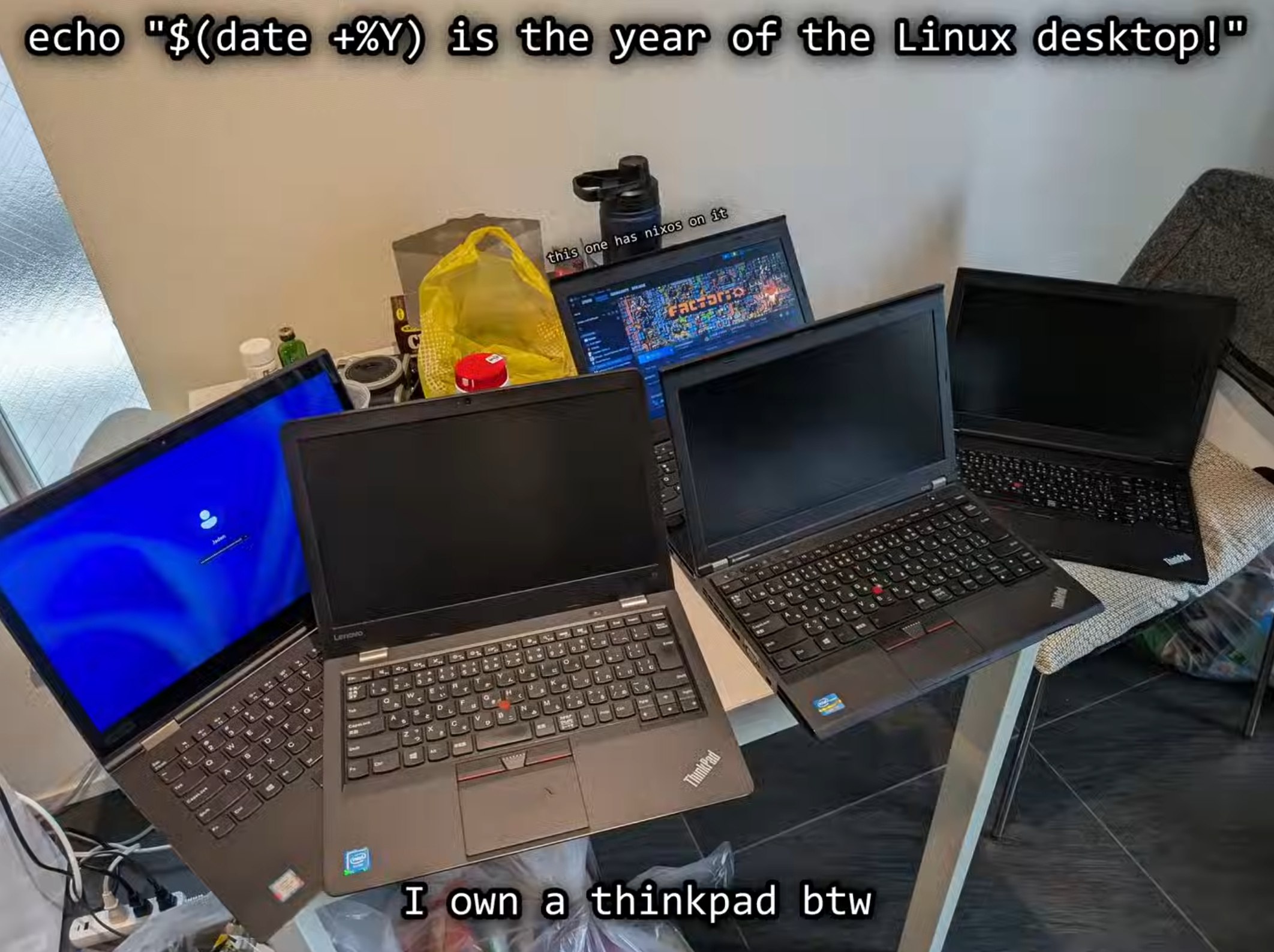 Мем "echo "$(date +%Y) is the year of the Linux desktop!"" с множеством ноутбуков ThinkPad