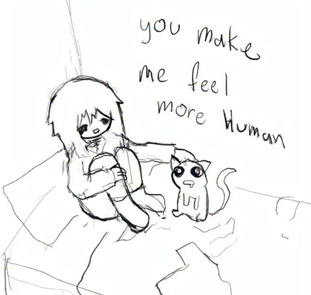 Грустный человек сидит на кровати рядом с котом: «You make me feel more human» — «Ты заставляешь меня чувствовать себя более человечным».